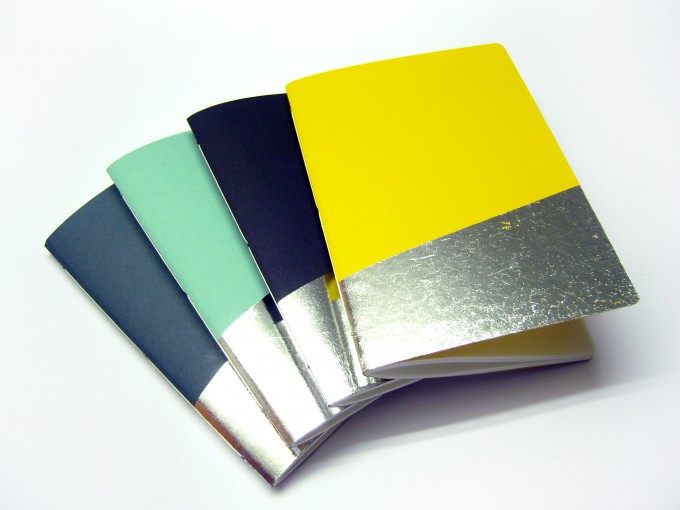 Handmade notebooks decorated with a silver foil on the front and back cover. Purchase one of these on dawanda.de/emadam